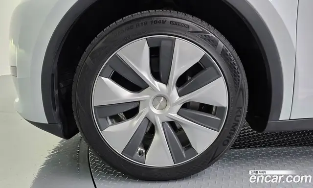 Tesla Model Y 2024 0.2 автомат (гидро), миниатюра 5