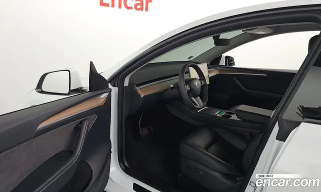 Tesla Model Y 2024 0.2 автомат (гидро), миниатюра 12