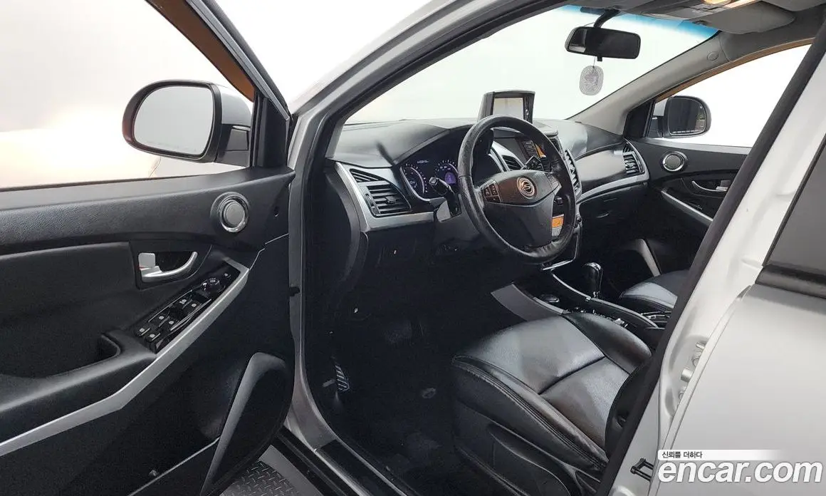 SsangYong Korando 2013 2.0 автомат (гидро), фото 10