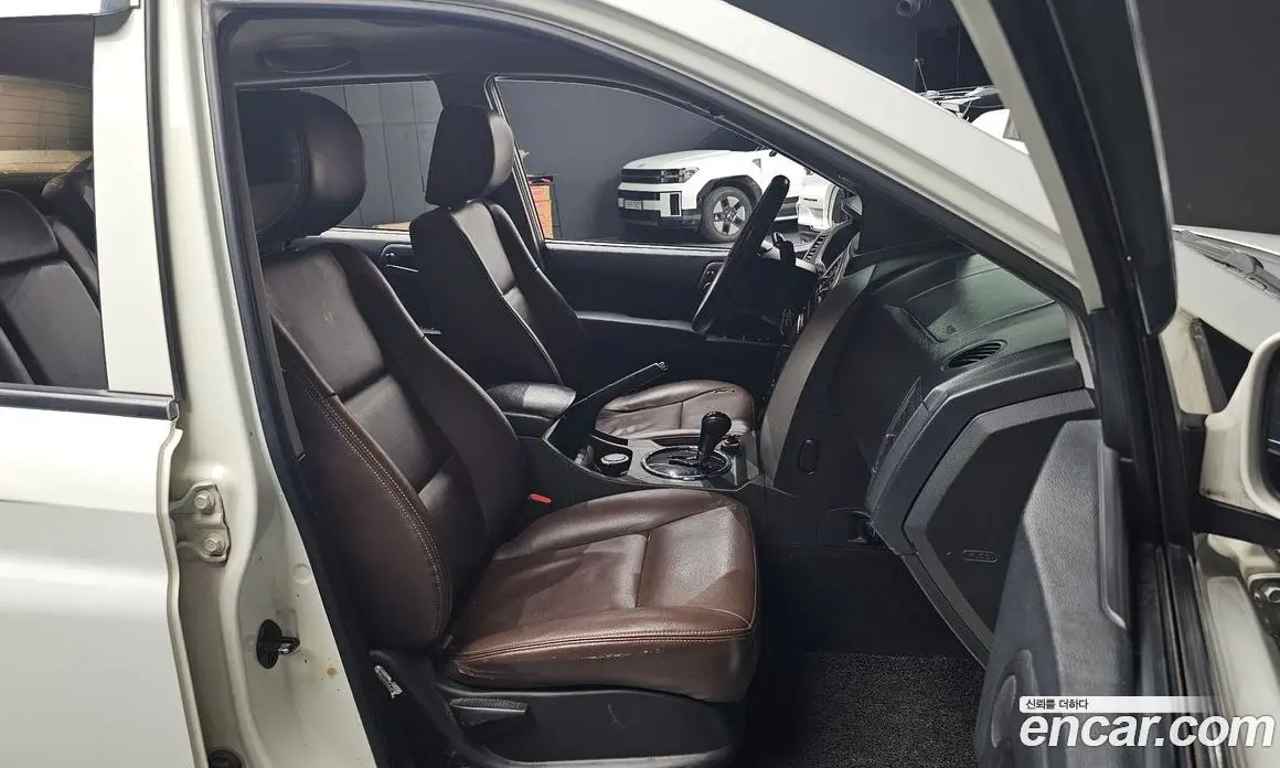 SsangYong Korando 2014 2.0 автомат (гидро), фото 11