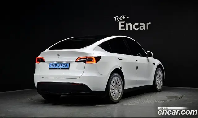 Tesla Model Y 2024 0.2 автомат (гидро), миниатюра 2