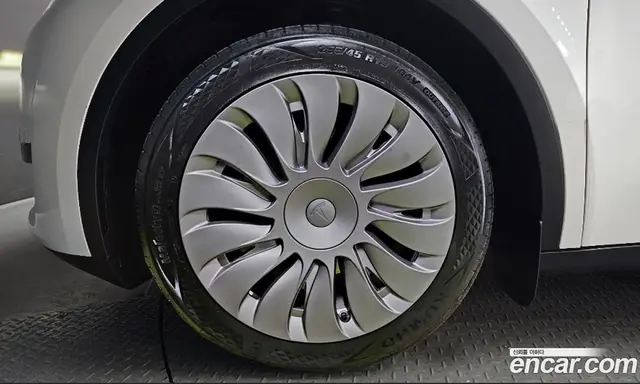 Tesla Model Y 2024 0.2 автомат (гидро), миниатюра 5