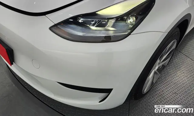 Tesla Model Y 2024 0.2 автомат (гидро), миниатюра 7