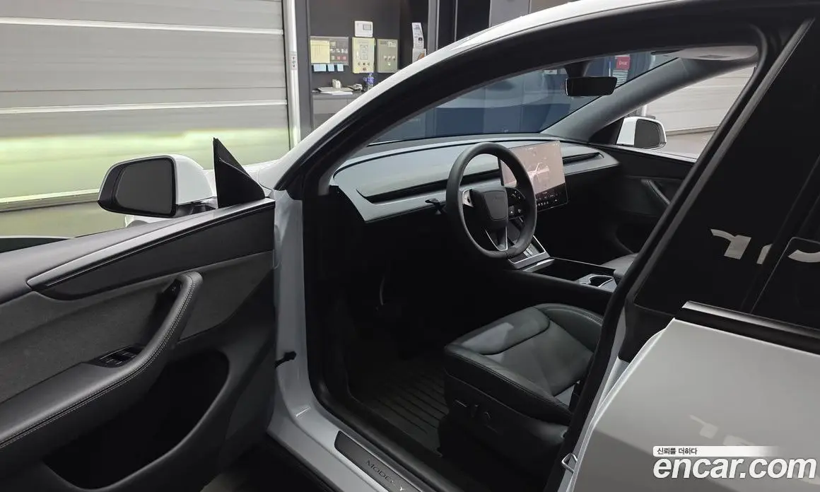 Tesla Model Y 2025 0.2 автомат (гидро), фото 10