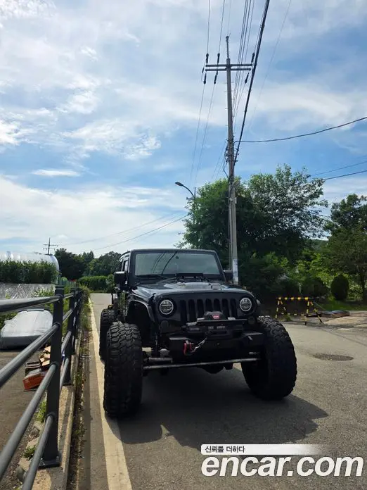 Jeep Wrangler 2013 2.8 автомат (гидро), миниатюра 1