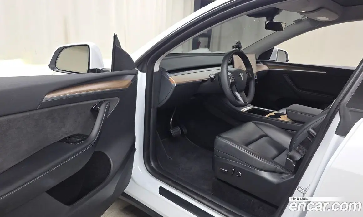 Tesla Model Y 2024 0.2 автомат (гидро), фото 12