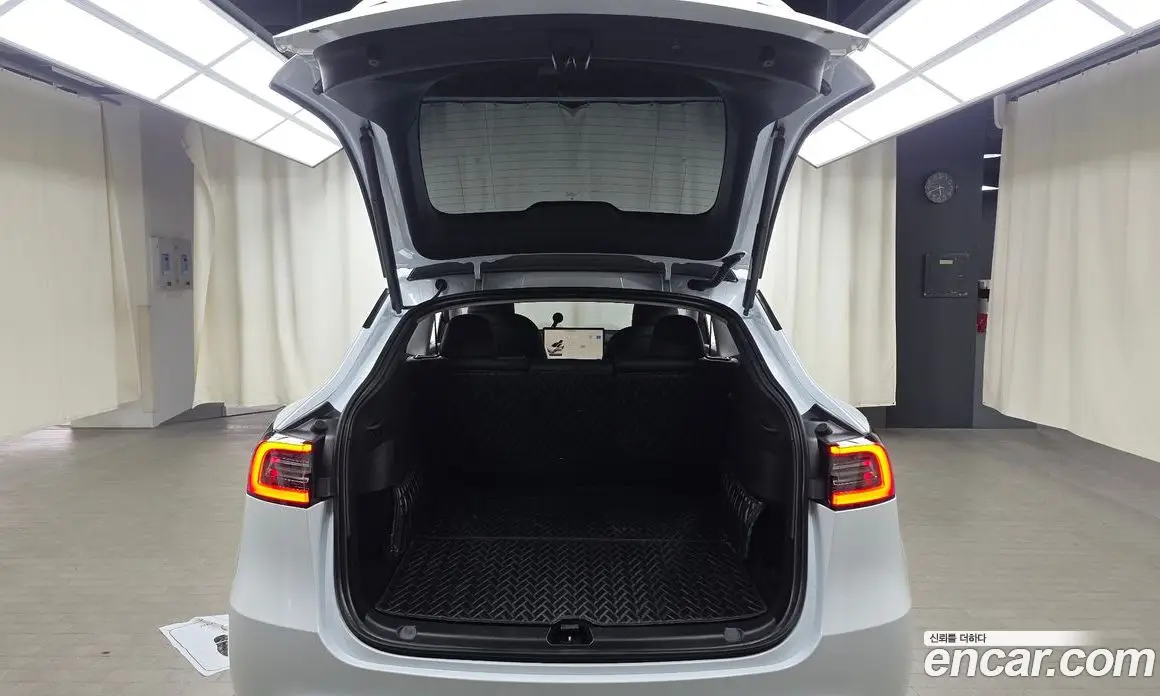 Tesla Model Y 2024 0.2 автомат (гидро), фото 25