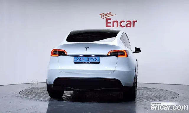 Tesla Model Y 2024 0.2 автомат (гидро), миниатюра 3