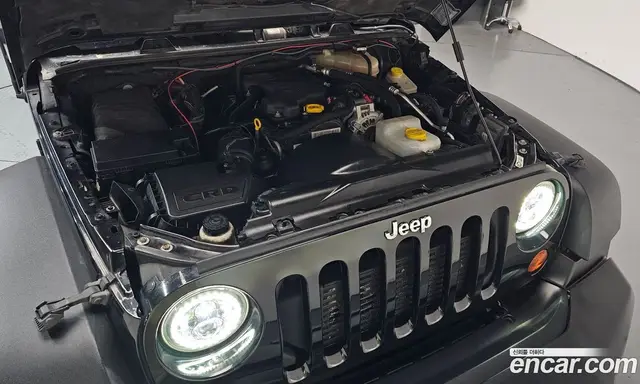 Jeep Wrangler 2013 2.8 автомат (гидро), миниатюра 5