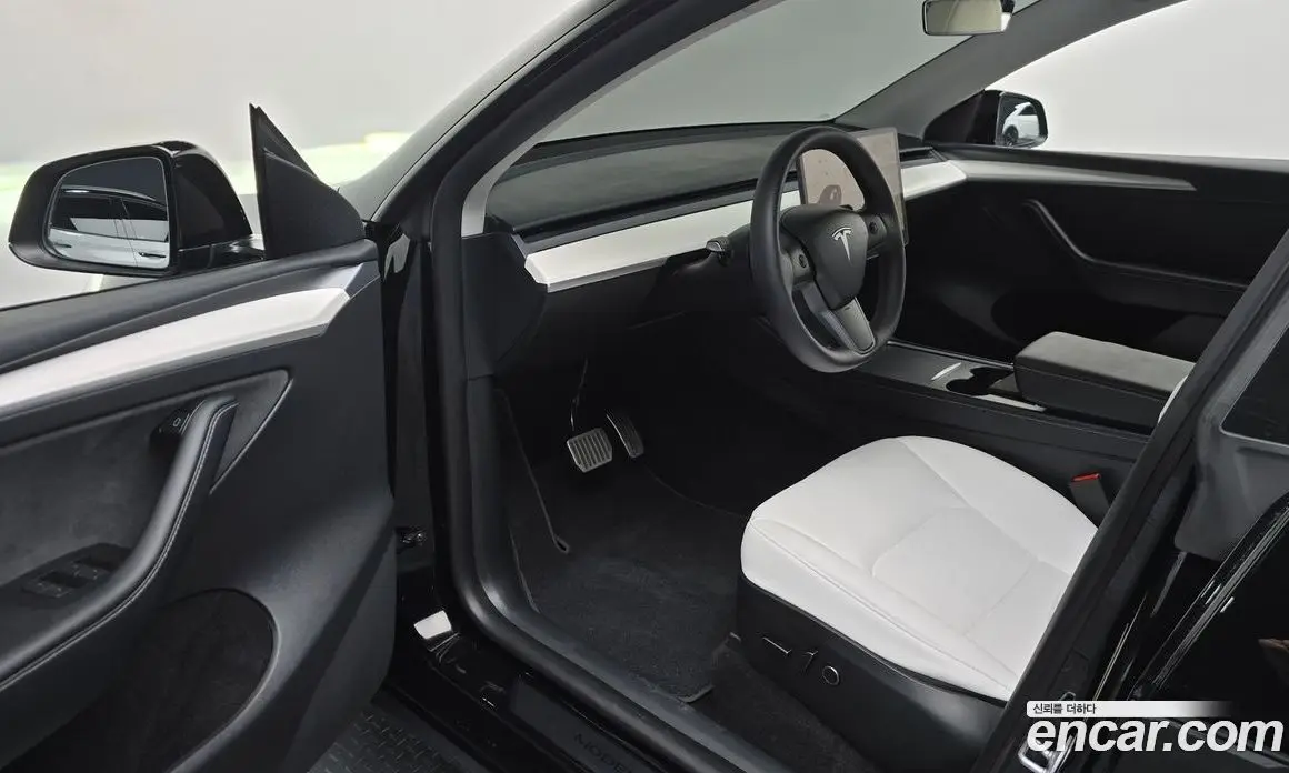 Tesla Model Y 2023 0.2 автомат (гидро), фото 13