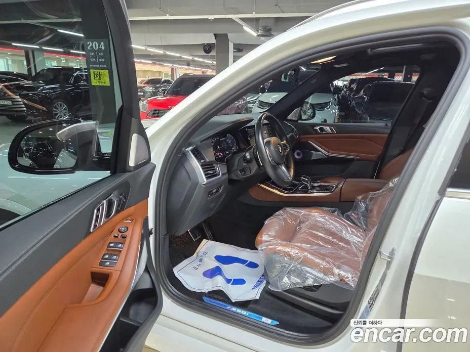 BMW X5 2022 4.4 автомат (гидро), фото 7