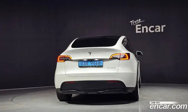 Tesla Model Y 2022 0.2 автомат (гидро), миниатюра 4