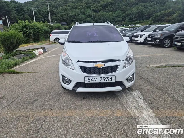 Chevrolet Spark 2011 1.0 автомат (гидро), миниатюра 1