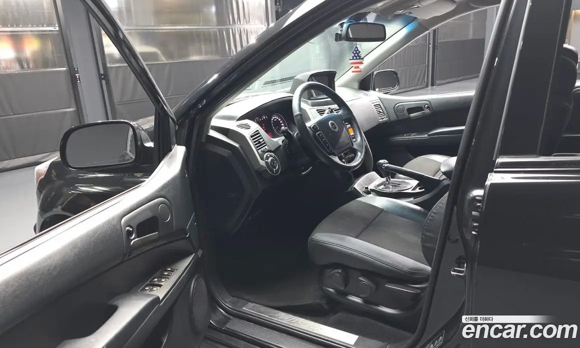 SsangYong Korando 2013 2.0 автомат (гидро), фото 13