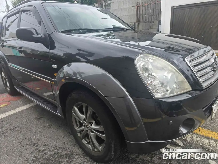 SsangYong Rexton 2011 2.0 автомат (гидро), фото 1