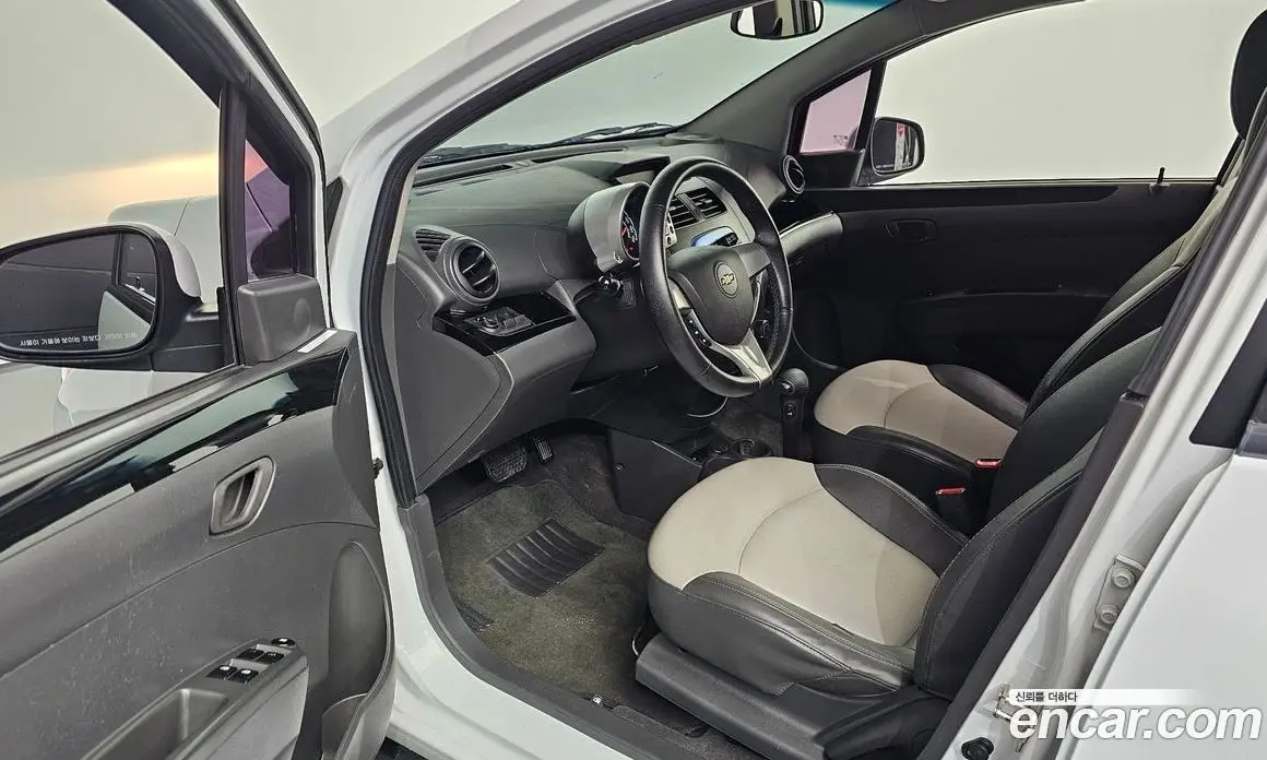 Chevrolet Spark 2011 1.0 автомат (гидро), фото 13
