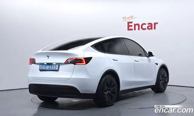 Tesla Model Y 2024 0.2 автомат (гидро), миниатюра 2