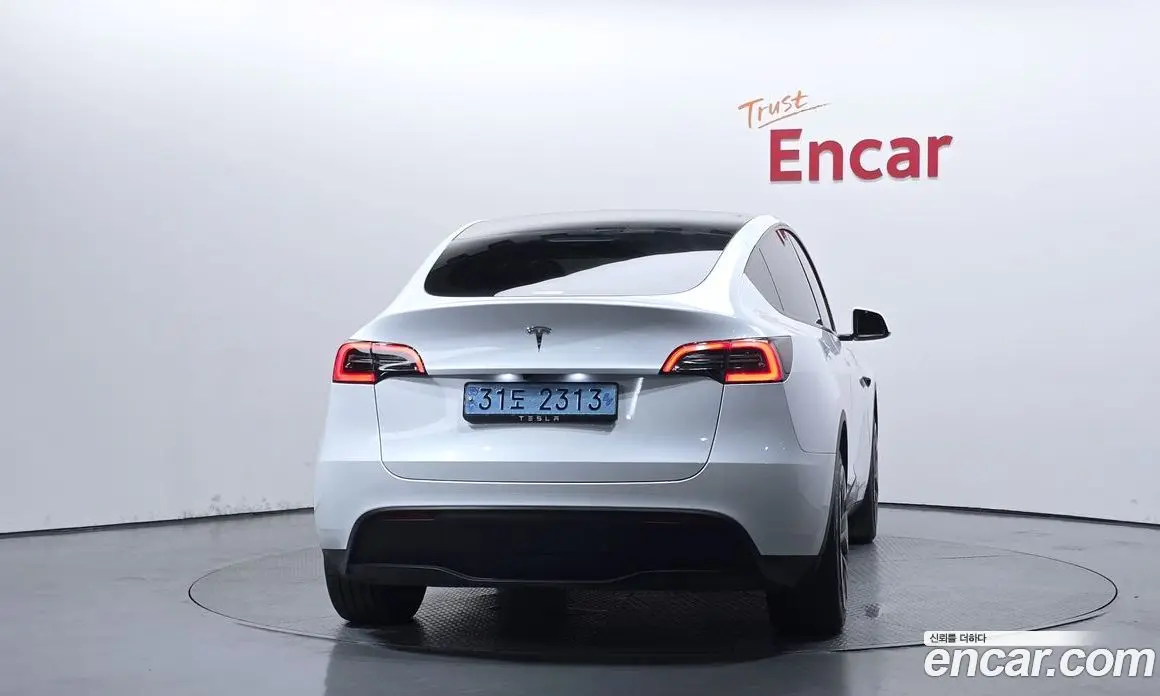 Tesla Model Y 2024 0.2 автомат (гидро), фото 4