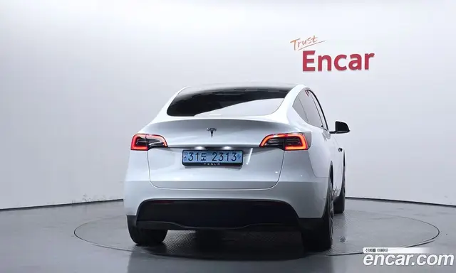 Tesla Model Y 2024 0.2 автомат (гидро), миниатюра 4