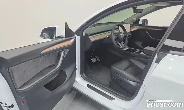 Tesla Model Y 2024 0.2 автомат (гидро), миниатюра 10