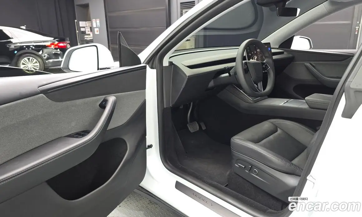 Tesla Model Y 2025 0.2 автомат (гидро), фото 13