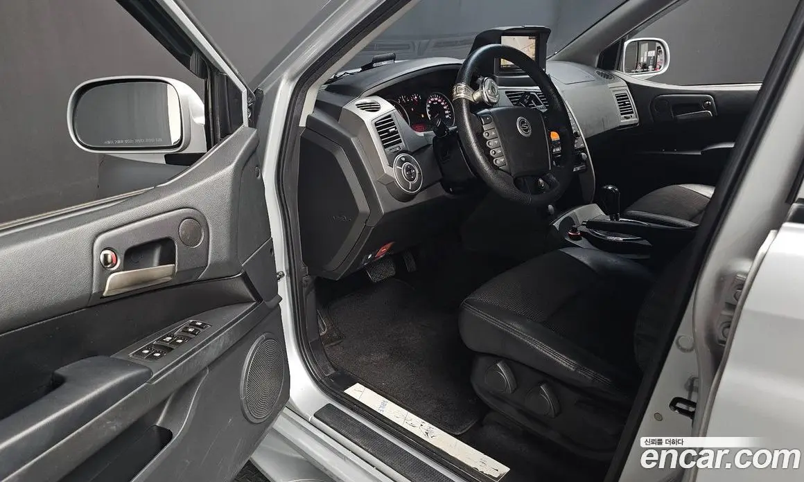SsangYong Korando 2013 2.0 автомат (гидро), фото 11