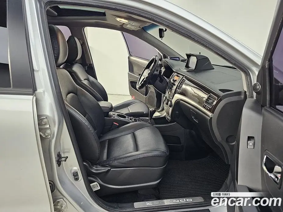 SsangYong Korando 2011 2.0 автомат (гидро), фото 11