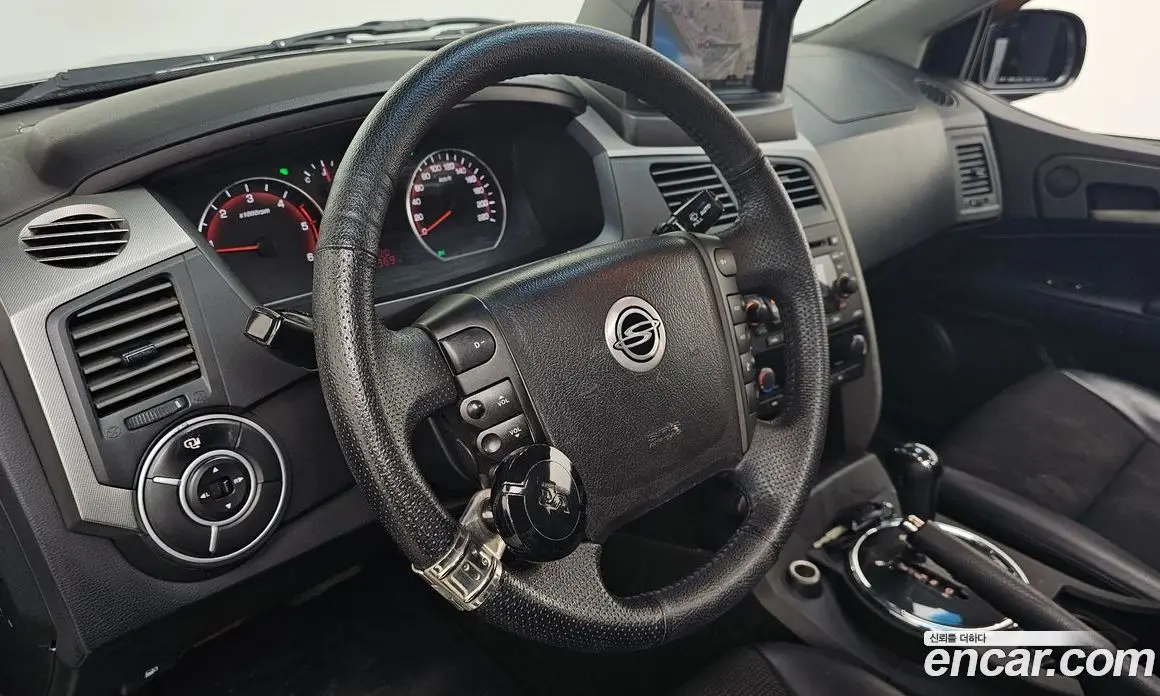 SsangYong Korando 2012 2.0 автомат (гидро), фото 18