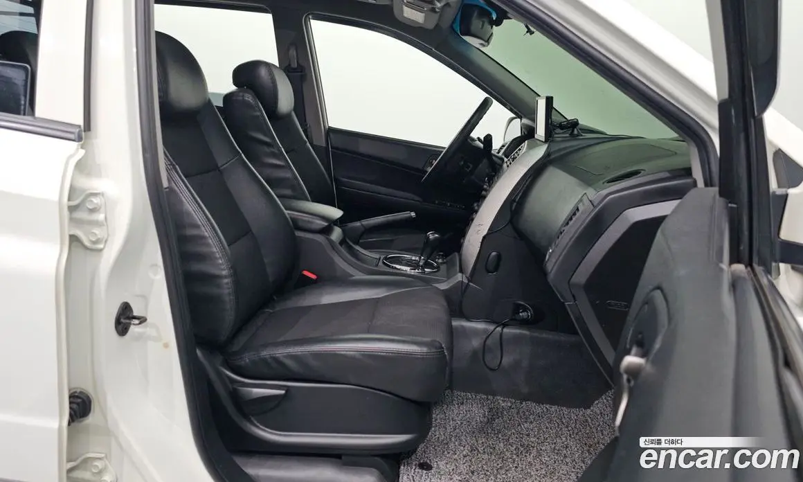 SsangYong Korando 2012 2.0 автомат (гидро), фото 16