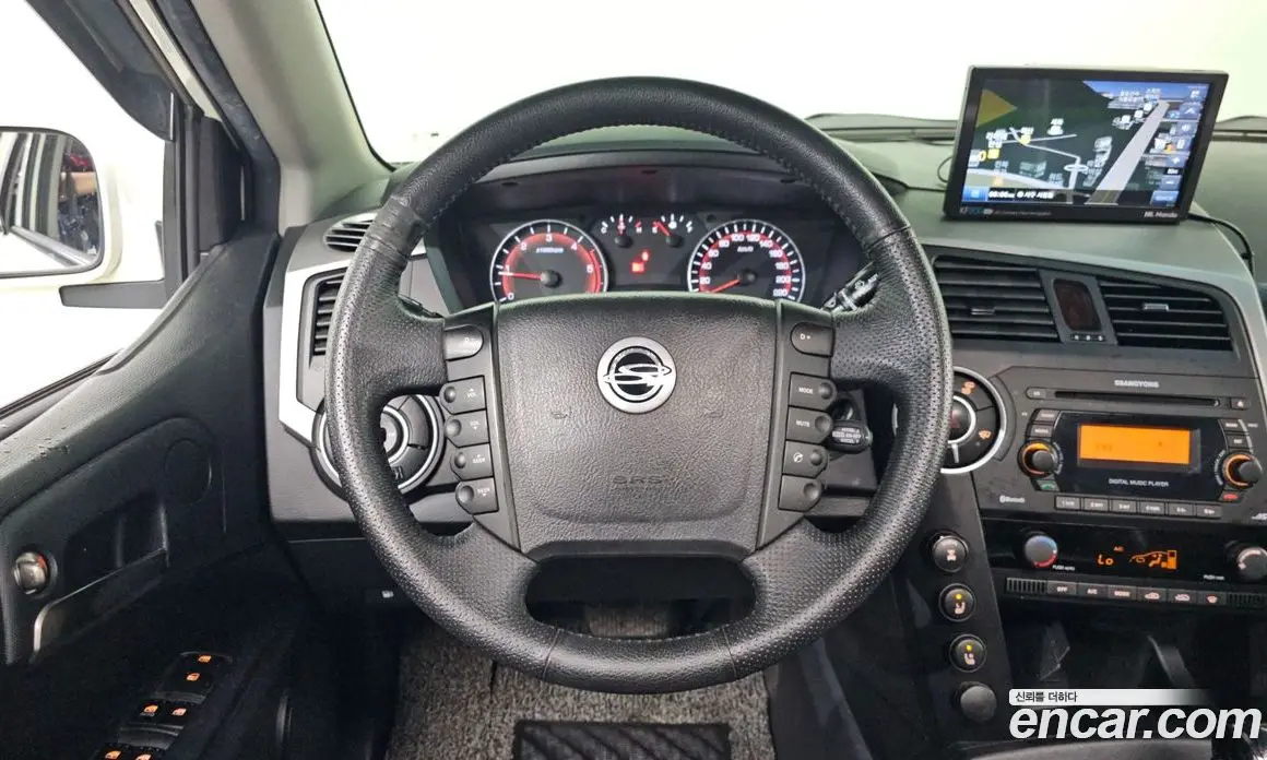 SsangYong Korando 2012 2.0 автомат (гидро), фото 19