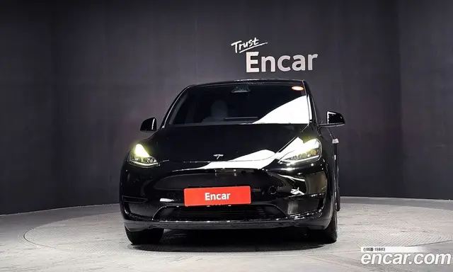 Tesla Model Y 2024 0.2 автомат (гидро), миниатюра 3