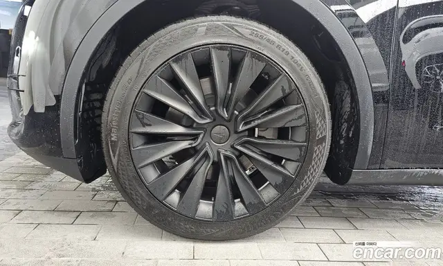 Tesla Model Y 2024 0.2 автомат (гидро), миниатюра 5