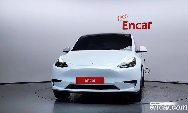 Tesla Model Y 2024 0.2 автомат (гидро), миниатюра 3
