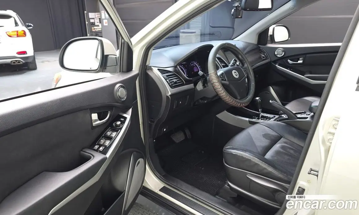 SsangYong Korando 2013 2.0 автомат (гидро), фото 10