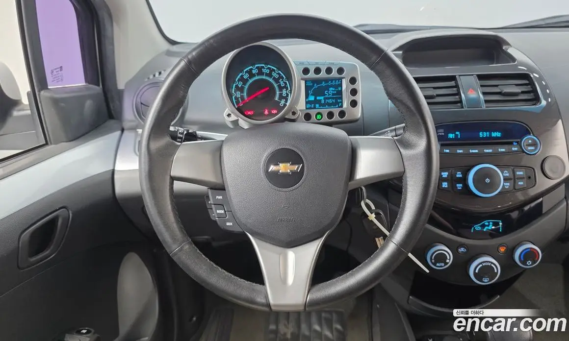 Chevrolet Spark 2011 1.0 автомат (гидро), фото 13