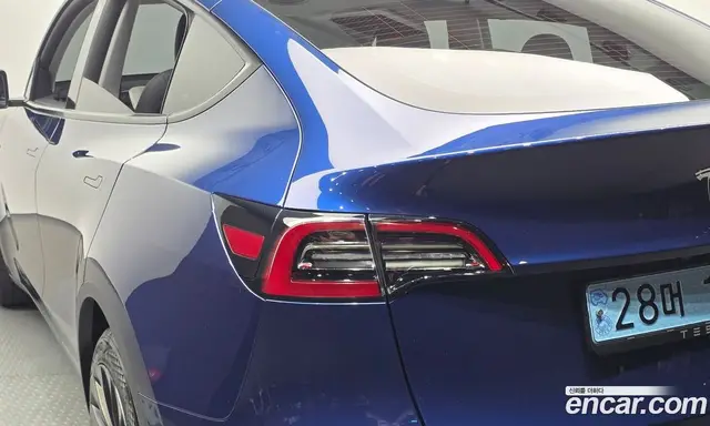 Tesla Model Y 2024 0.2 автомат (гидро), миниатюра 9