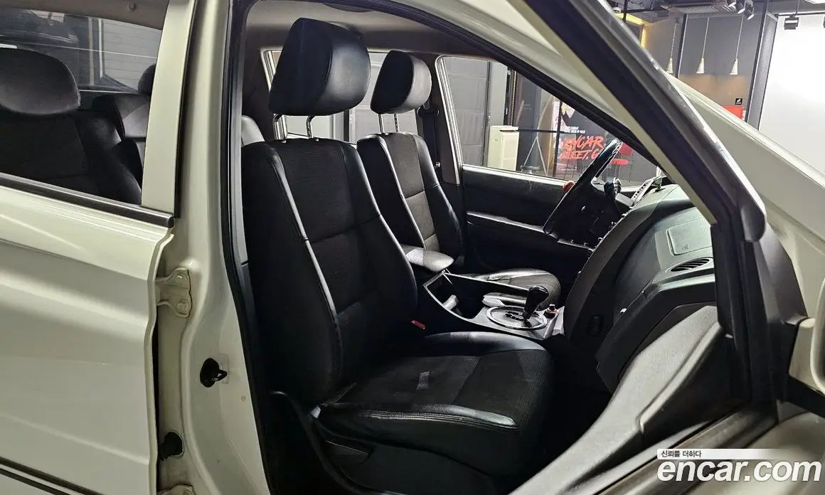 SsangYong Korando 2013 2.0 автомат (гидро), фото 12