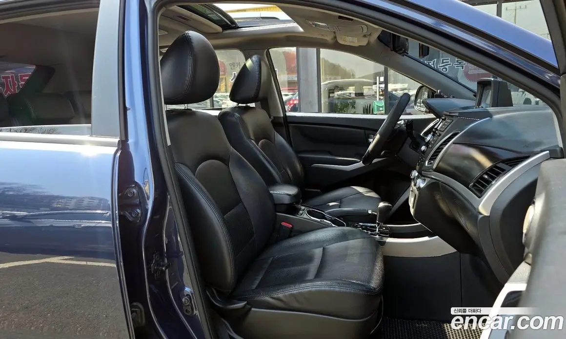 SsangYong Korando 2013 2.0 автомат (гидро), фото 10