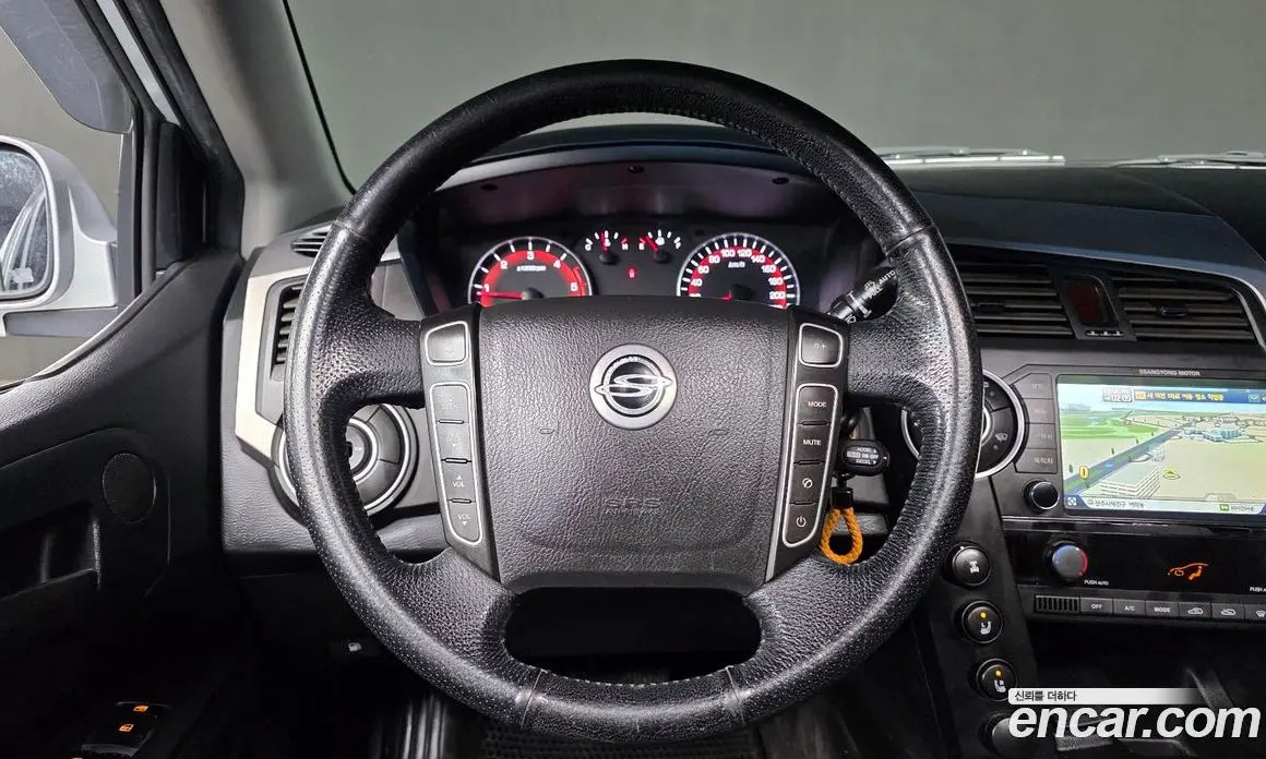 SsangYong Korando 2013 2.0 автомат (гидро), фото 14