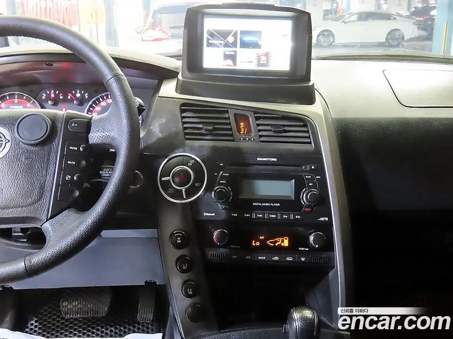 SsangYong Korando 2012 2.0 автомат (гидро), фото 11