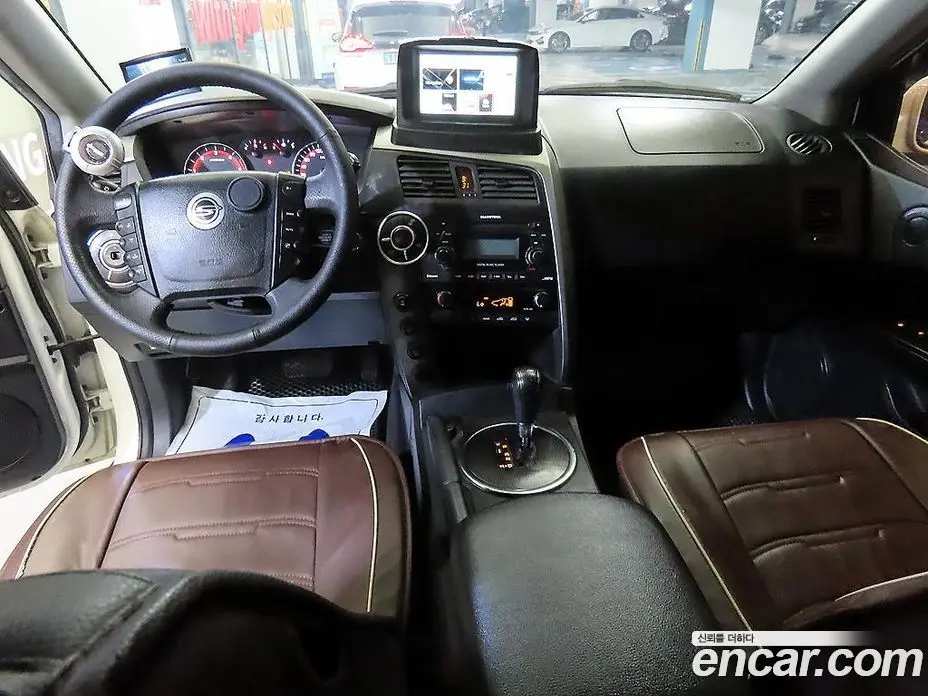 SsangYong Korando 2012 2.0 автомат (гидро), фото 10