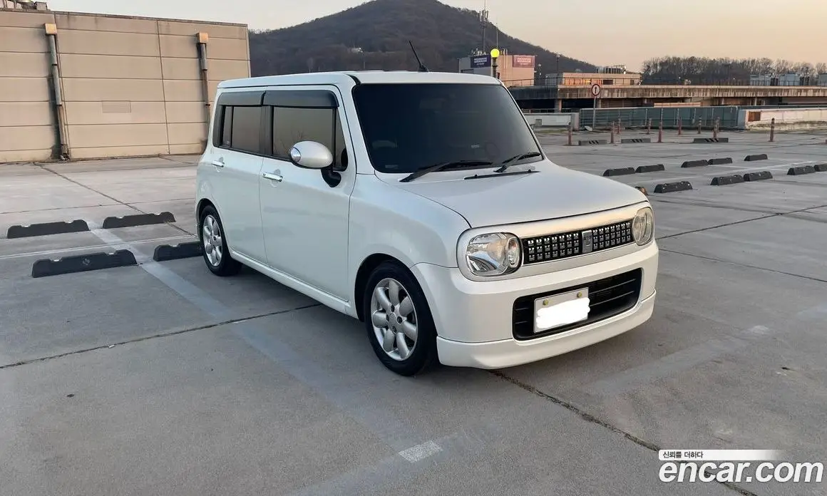 Suzuki Alto Lapin 2013 0.7 автомат (гидро), фото 1 Suzuki Alto Lapin 2013 0.7 автомат (гидро), фото 1
