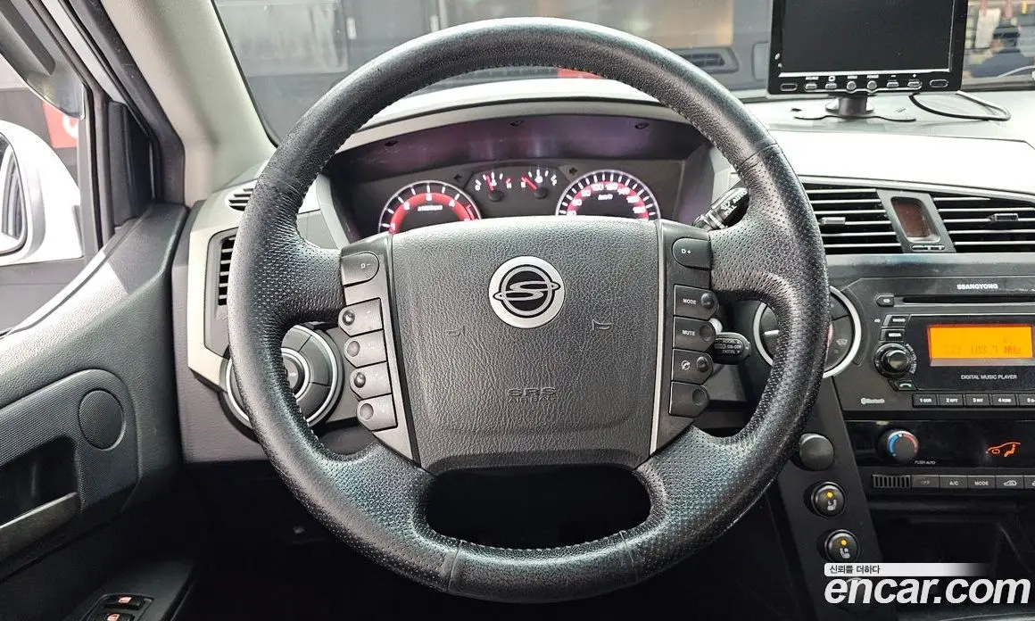 SsangYong Korando 2012 2.0 автомат (гидро), фото 12