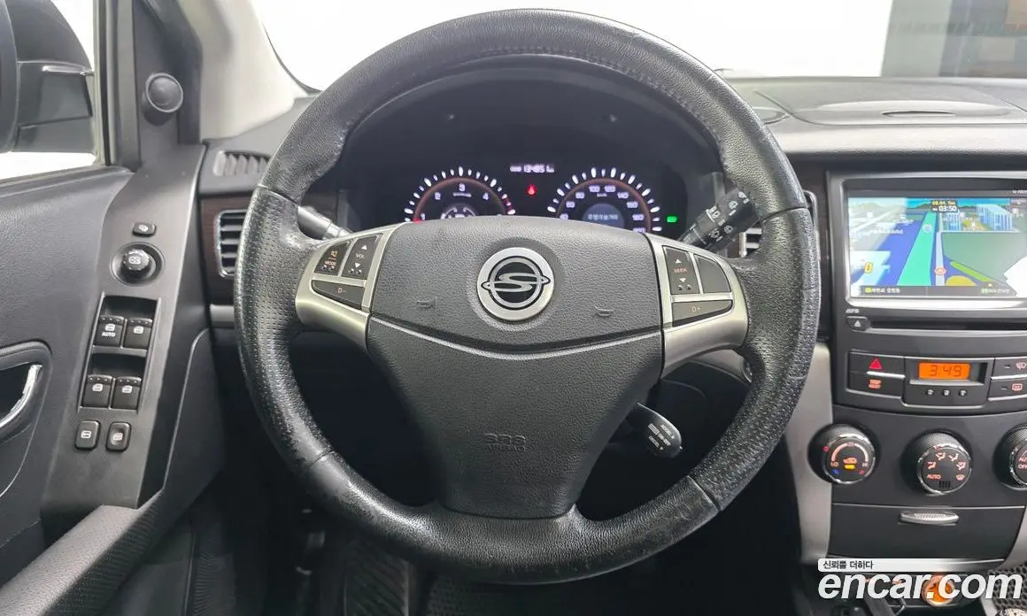 SsangYong Korando 2011 2.0 автомат (гидро), фото 13