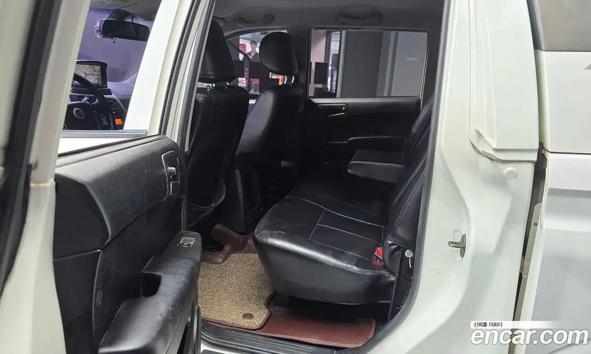 SsangYong Korando 2013 2.0 автомат (гидро), фото 12