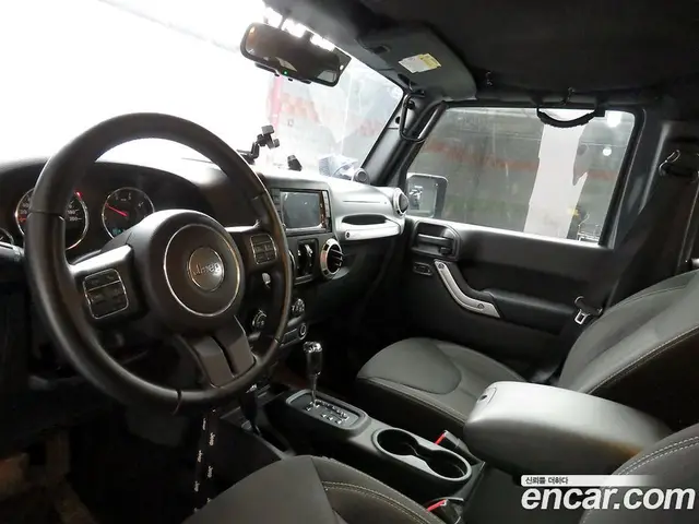 Jeep Wrangler 2014 2.8 автомат (гидро), миниатюра 7