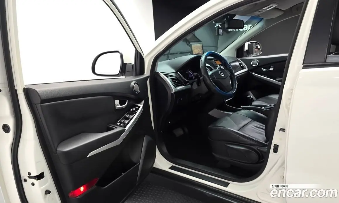 SsangYong Korando 2014 2.0 автомат (гидро), фото 10