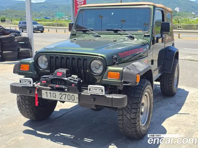 Jeep Wrangler 1997 2.5 механика, миниатюра 4