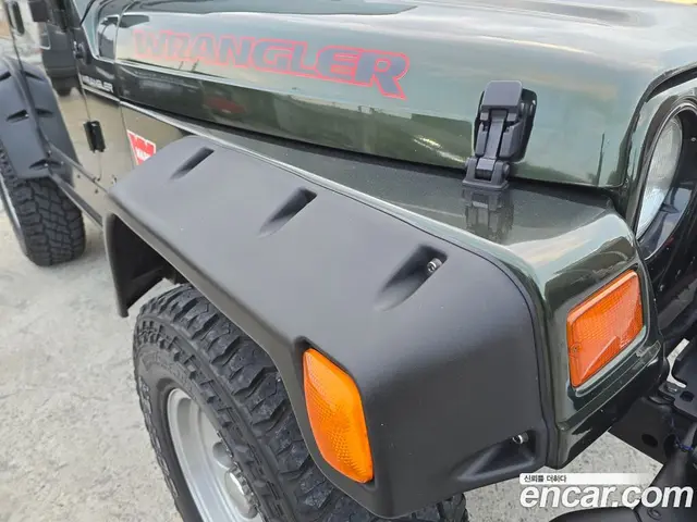 Jeep Wrangler 1997 2.5 механика, миниатюра 6