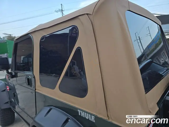 Jeep Wrangler 1997 2.5 механика, миниатюра 10